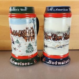 VTG. 2 Budweiser Holiday Clydesdale Stein Pair with Green and Blue Accents.